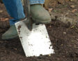 Spade in de grond